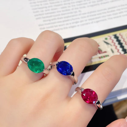 Solitaire Ring Oval Cut Ruby, Emerald or Sapphire setting.