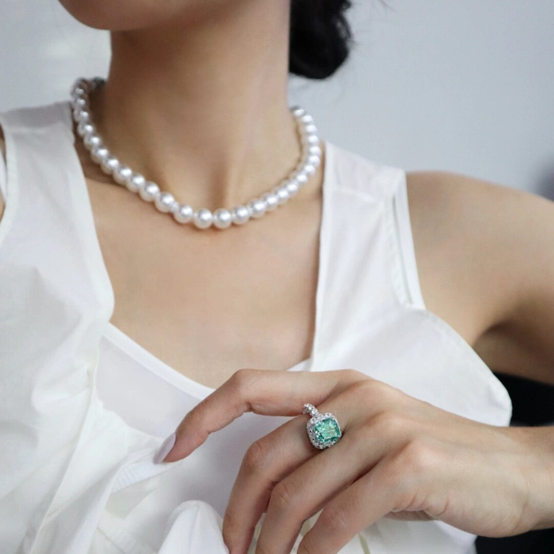 Pearl Necklace with Paraiba and Diamonds