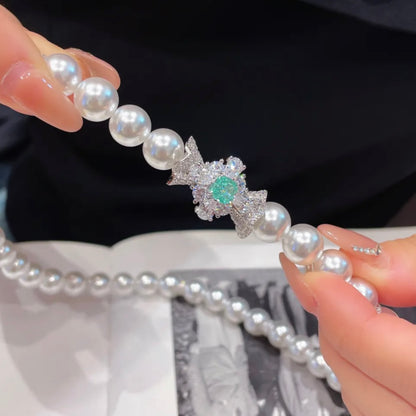 Pearl Necklace with Paraiba and Diamonds