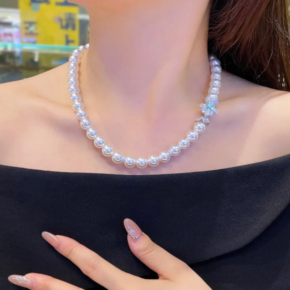 Pearl Necklace with Paraiba and Diamonds