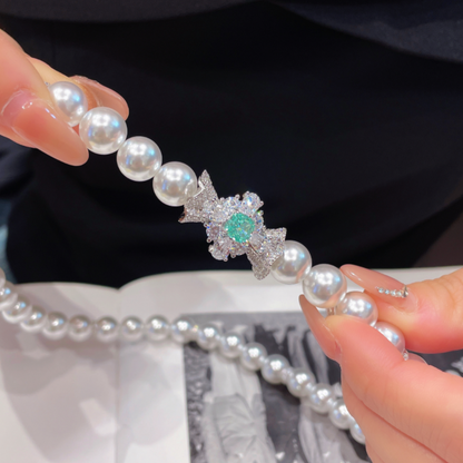 Pearl Necklace with Paraiba and Diamonds